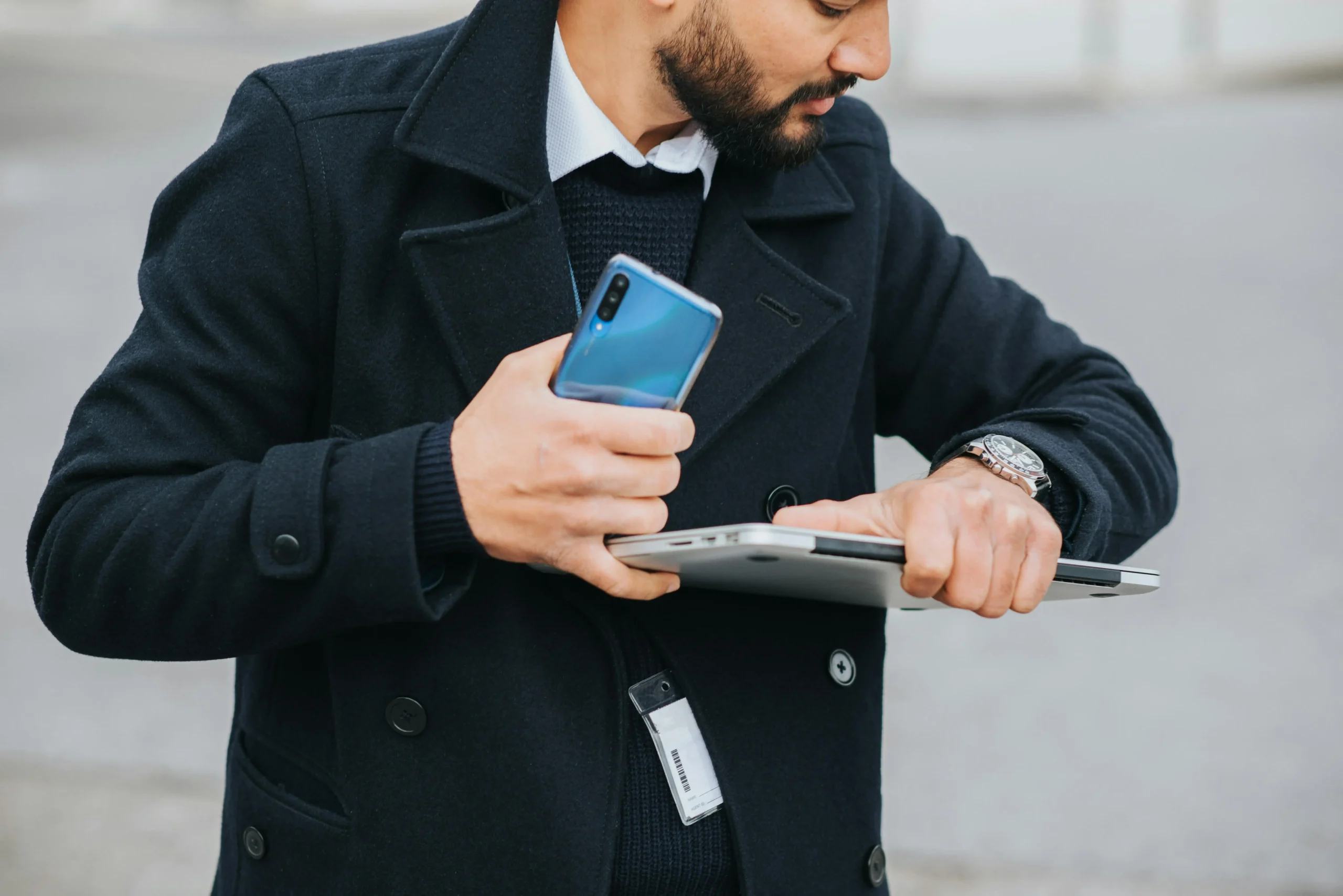 A man looking at his wristwatch